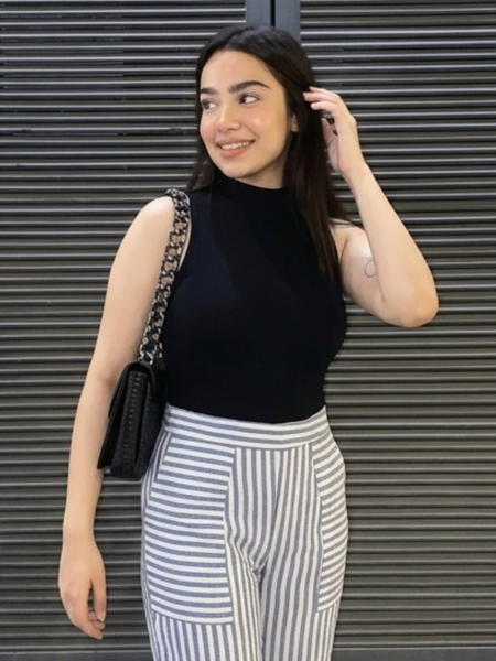 Back view of women striped cotton pants with pockets