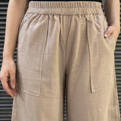 Model wearing solid balloon trousers casual styling