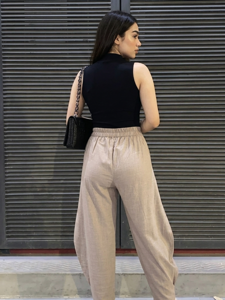 Back view of barrel fit balloon pants for women