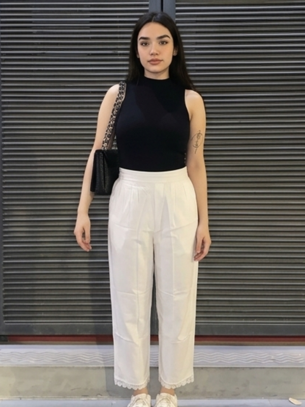 Women white palazzo pants with lace detail front view