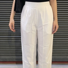 Model wearing white palazzo with kurta styling