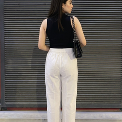 Back view of women white ethnic palazzo pants