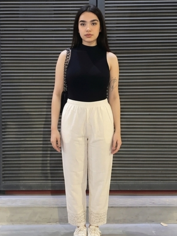 Women white palazzo pants lace detail front view