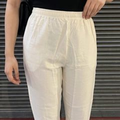 Model wearing white palazzo with kurta outfit