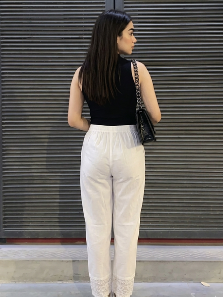 Back view of women white ethnic palazzo pants